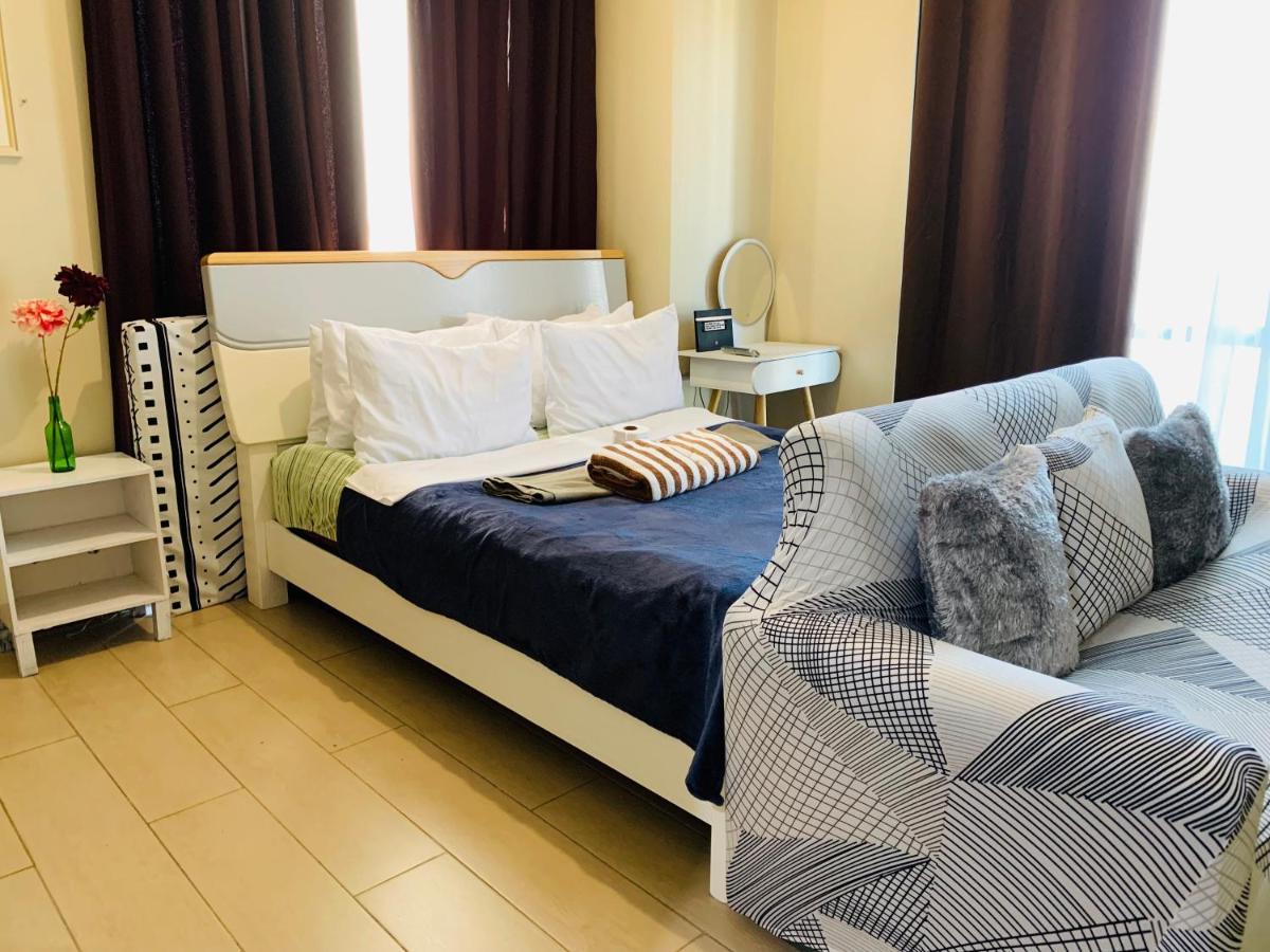Two Palm Tree Villas Condominium - Studio 8Th Fl With Balcony - Across Terminal 3 Airport 파사이 외부 사진